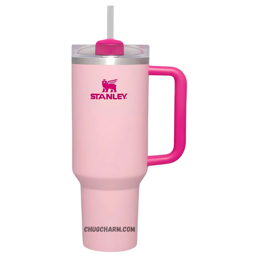 Stanley 40 oz Tumbler in Flamingo Pink with a sturdy handle and double-wall insulation for superior temperature retention.