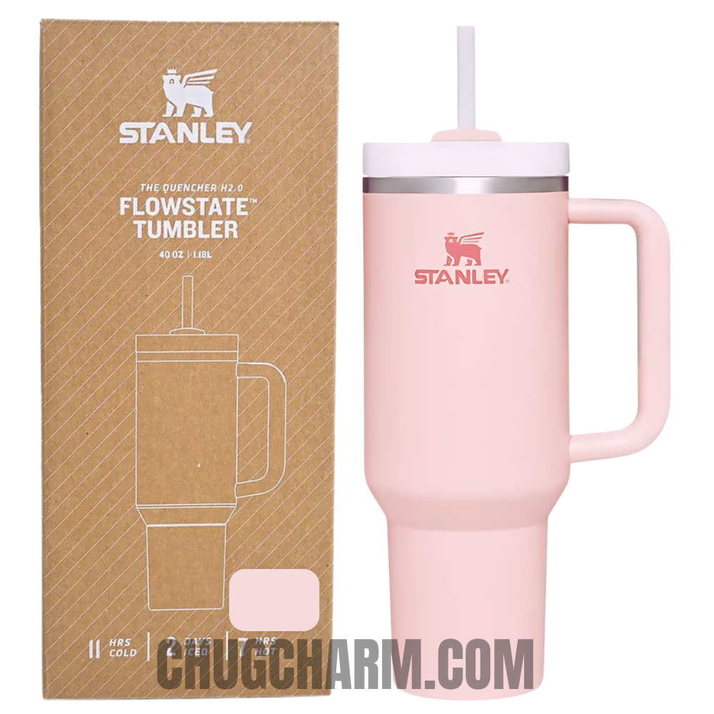 Stanley 40 oz Tumbler in Pink with a durable handle and double-wall insulation for superior temperature retention.