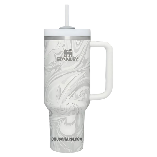 Stanley 40 oz Tumbler in Polar Swirl, designed with a stylish and unique swirl pattern, featuring a sturdy handle and double-wall insulation for excellent temperature retention, ideal for keeping drinks hot or cold.
