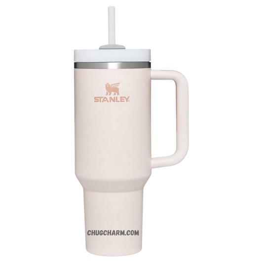 Stanley 40 oz Tumbler in Rose Quartz with a durable handle and double-wall insulation for keeping drinks at the perfect temperature.
