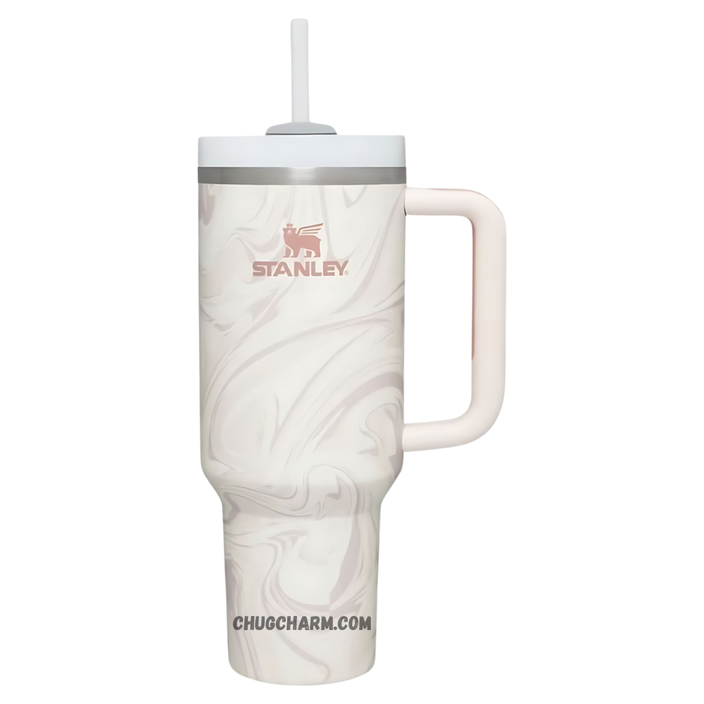 Stanley 40 oz Tumbler in Rose Quartz Swirl with a stylish swirl pattern, ergonomic handle, and double-wall insulation for keeping drinks hot or cold