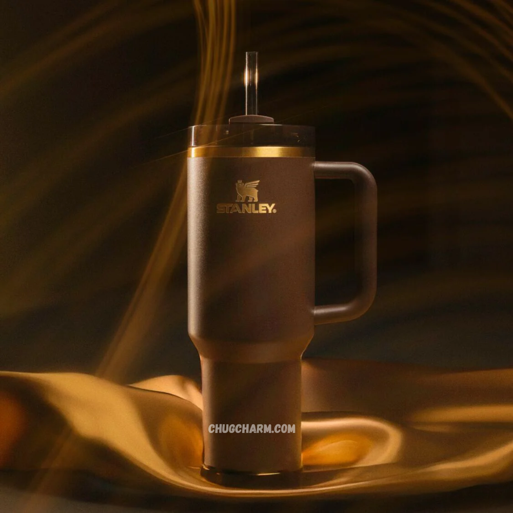 Stanley X Wicked Elphaba Chocolate Gold 40 oz Tumbler with a unique design, durable handle, and double-wall insulation for maintaining drink temperature.