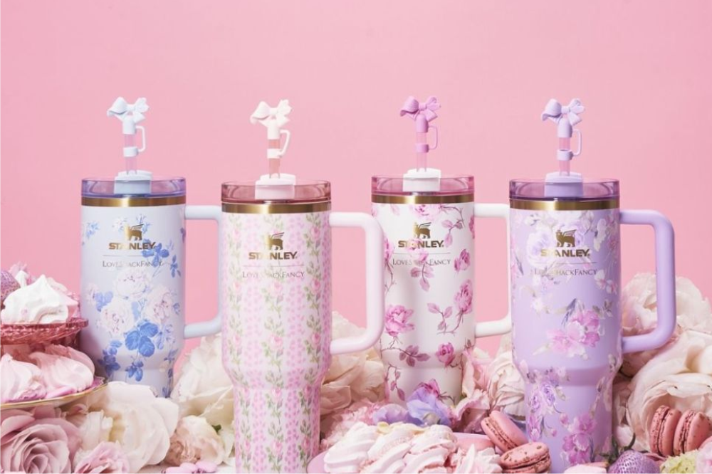 Stanley x LoveShackFancy banner featuring floral-themed tumblers with romantic and feminine designs